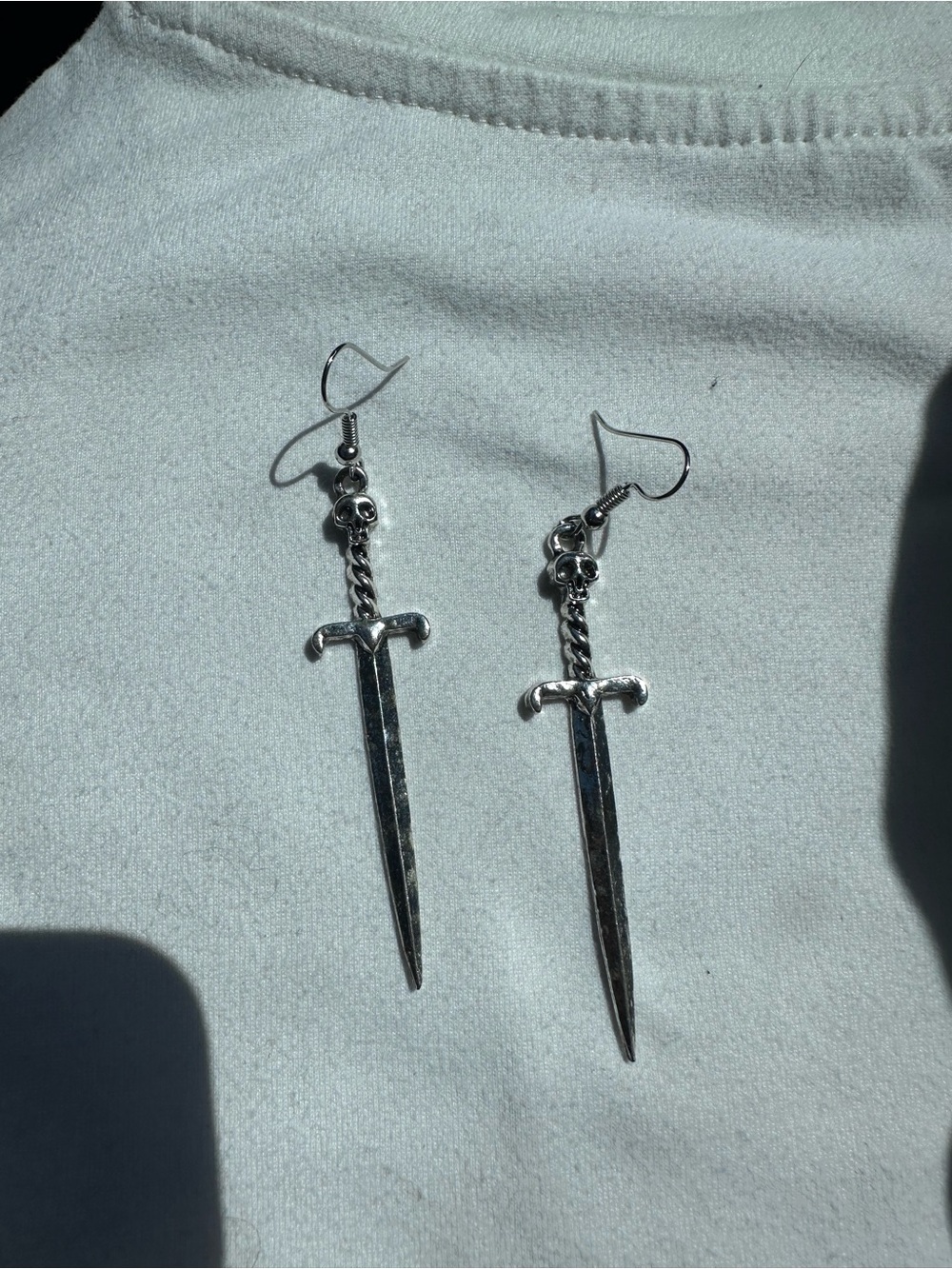 Silver Sword Dangle Earrings with Skull Detail